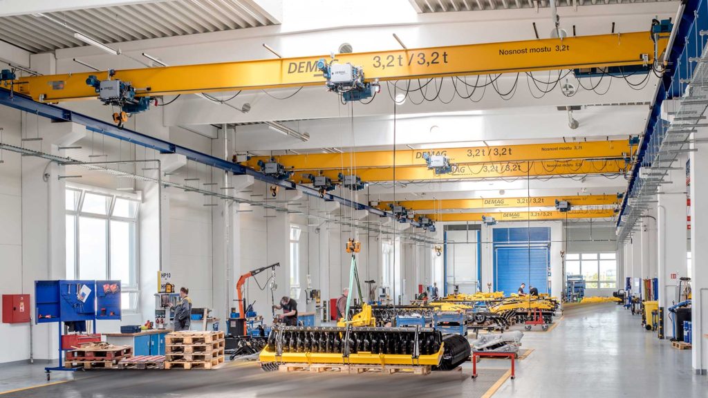 Demag DMR wire rope hoist lifting a load.