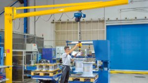 Using Demag Manulift to lift a product onto a pallet